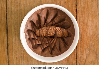 Overhead View Of  Homemade Chocolate Italian Ice Cream Tub On Wooden Background , Very Shallow Depth Of Field. 