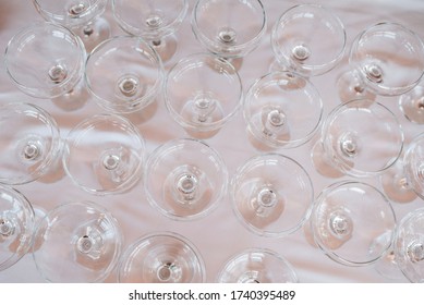 Overhead View Of Many Empty Wine Glasses. Top View On Bar Counter.