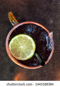 Overhead View Of A Moscow Mule With Slice Of Lime In A Copper Mug.