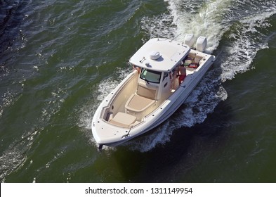 Overhead View Of A Motor Boat Powered By Two Outboard Engines