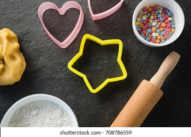 Overhead view of moulds with candies in bowl on table - Powered by Shutterstock