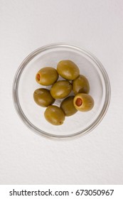 Overhead View Of Olives In Glass Bowl On Table