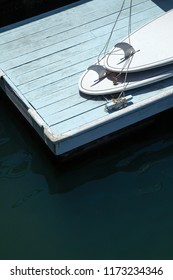 Overhead View On A Pair Of Stand Up Paddle Boards On A Lake Dock, With Space For Text On Bottom