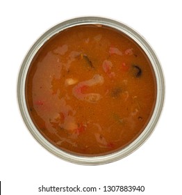 Overhead View Of An Open Can Of Chicken Tortilla Soup Isolated On A White Background.