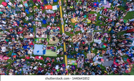 Overhead View Of People In A City Park On A Summer Day, Sitting, Standing, On Picnic Rugs In Ankara / Turkey - June 28, 2019