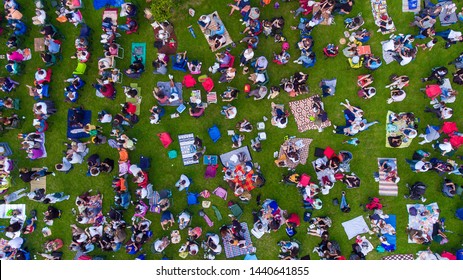 Overhead View Of People In A City Park On A Summer Day, Sitting, Standing, On Picnic Rugs In Ankara / Turkey - June 28, 2019