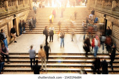 Overhead View Of People Climbing Stairs In Central Park, New York City With Bright Shining Sunlight Background