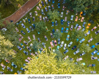 Overhead View Of People Do Yoga At City Public Park