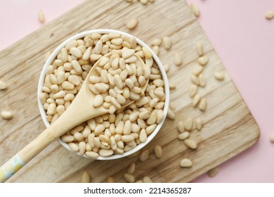 overhead view of pine nuts in a bowl 