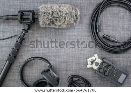 Overhead view of professional digital audio recording gear and microphone.