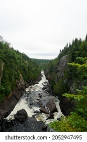 Overhead View Of Rapids With Rockface On Either Side Taken From Suspension Bridge At Pukaskwa National Park