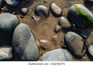 Overhead View Of Rock Pool Left Behind At Low Tide