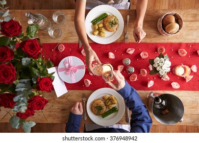 Overhead View Of Romantic Couple At Valentines Day Meal