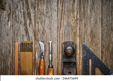 overhead view of a set of old wood working tools - Powered by Shutterstock