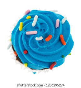 Overhead View Of A Single Blue Frosted Chocolate Cupcake Isolated On A White Background.