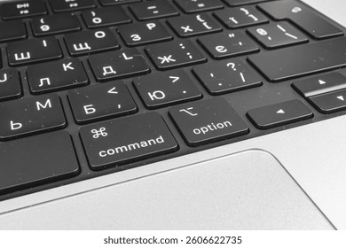 Overhead view of a sleek, modern laptop keyboard with English labeled keys Includes alphabets, numbers, punctuation marks, function keys, and special keys typical of a standard computer keyboard - Powered by Shutterstock - Get 15% off with code: PIKWIZARD15