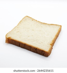 Overhead view of slice of white bread on white background
