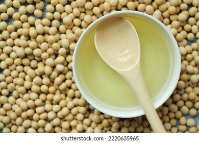 Overhead View Of Soy Beans And Oil On Table 