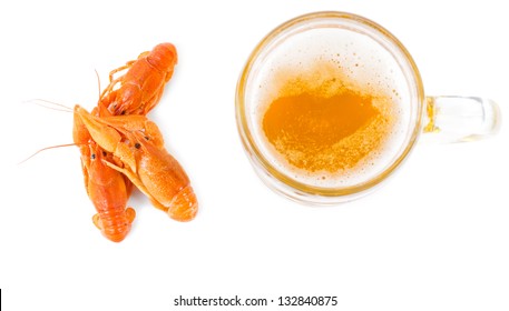 Overhead View Of Three Tasty Whole Cooked Prawns Served Together With A Glass Tankard Of Golden Ale Or Beer On A White Background