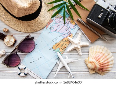 Overhead view of Traveler's accessories. Essential vacation items. Travel concept background. Flat lay - Powered by Shutterstock