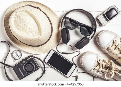 Overhead View Of Traveler's Essential Items, Travel Accessories Concept Background