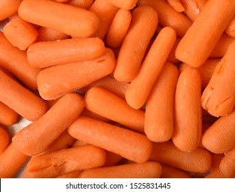 Overhead View Of Washed And Peeled Baby Carrots