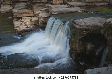 Overhead View Of Water Rushing Down A Waterfall