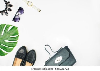 Overhead View Of Women's Fashion Set Of Accessories Isolated On White Background. Top View Of Leather Bag, Shoes, Sunglasses And Watch.