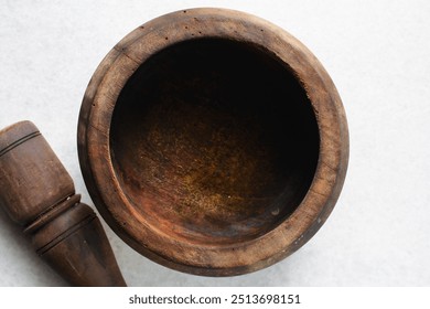 Overhead view of wooden mortar and pestle, top view of native wood mortar and pestle - Powered by Shutterstock