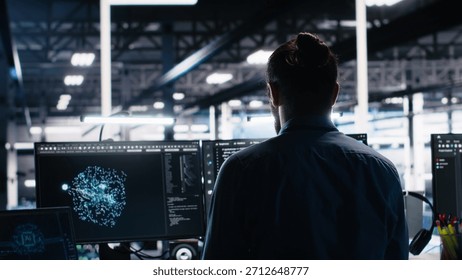 Overjoyed data center engineer dancing on chair after managing to analyze datasets using machine learning. Delighted server farm worker celebrating after using AI to recognize data patterns, camera A