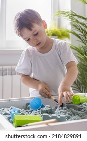 Overjoyed Male Kid Playing Kinetic Sand With Mother Babysitter Teacher Early Development Education Game Fine Motor Skills. Excited Baby Boy Holding Sandy Shape Enjoy Happy Childhood Education Play