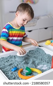 Overjoyed Male Kid Playing Kinetic Sand With Mother Babysitter Teacher Early Development Education Game Fine Motor Skills. Excited Baby Boy Holding Sandy Shape Enjoy Happy Childhood Education Play