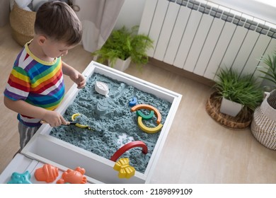 Overjoyed Male Kid Playing Kinetic Sand With Mother Babysitter Teacher Early Development Education Game Fine Motor Skills. Excited Baby Boy Holding Sandy Shape Enjoy Happy Childhood Education Play