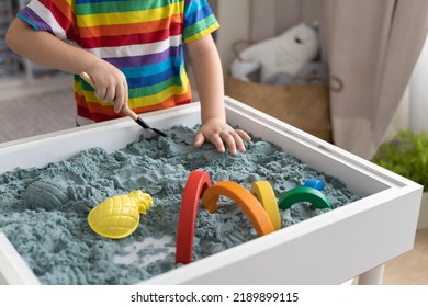 Overjoyed Male Kid Playing Kinetic Sand With Mother Babysitter Teacher Early Development Education Game Fine Motor Skills. Excited Baby Boy Holding Sandy Shape Enjoy Happy Childhood Education Play