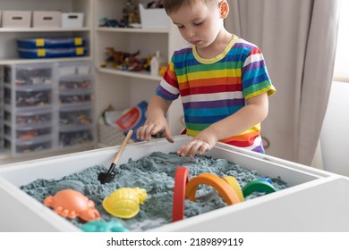 Overjoyed Male Kid Playing Kinetic Sand With Mother Babysitter Teacher Early Development Education Game Fine Motor Skills. Excited Baby Boy Holding Sandy Shape Enjoy Happy Childhood Education Play