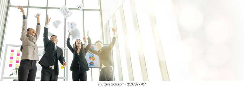 Overjoyed Young Asian Businesspeople Throw Paper Up In Air Feel Excited About Successful Startup Project Happy Asian Colleagues Have Fun Celebrate Business Success At Office Meeting Idea Web Banner 