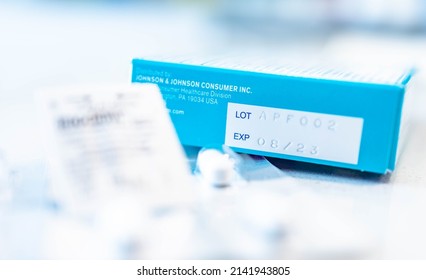 Overland Park, KS, USA - March 4, 2022: Selective Focus At Expiration Date, Lot Number On Blue Medical Johnson And Johnson Package From Manufacturing, Information Awareness. Healthcare Concept.