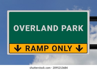 Overland Park logo. Overland Park lettering on a road sign. Signpost at entrance to Overland Park, USA. Green pointer in American style. Road sign in the United States of America. Sky in background