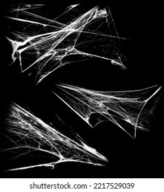 Overlay the cobweb effect. A collection of spider webs isolated on a black background. Spider web elements as decoration to the design. Halloween Props - Shutterstock ID 2217529039