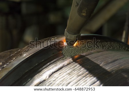 Overlay welding hard surfacing of steel roll by submerge arc welding process