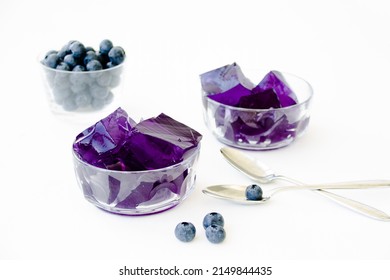 Over-lit Blueberry Jello Cutted In Cubes Composition 