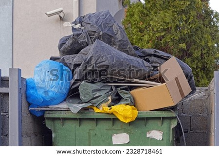 Overload dumpster container with garbage trash waste environment
