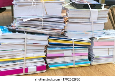 Overload Stack Messy Documents Of Report Papers For Reseacrch Teacher Classroom Planing On Desk Waiting To Managed Or Approve, Unorganized Management Stock Files For Check. Workload In Work Concept