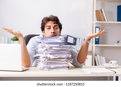 Overloaded Busy Employee With Too Much Work And Paperwork