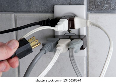 Overloaded Electrical Outlet With No Room For More Plugs