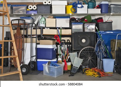 Overloaded suburban garage.  Boxes, coolers, sporting gear and more. - Powered by Shutterstock