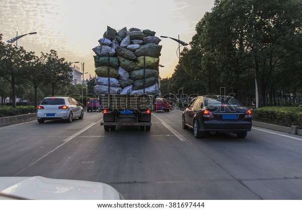 Overloaded truck on\
road