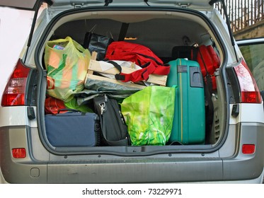 Overloaded Trunk Of A Car Leaving For The Winter Holidays With Your Family