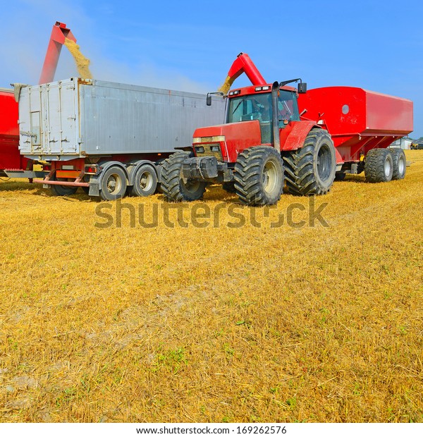 Overloading of grain\
bins in a car tractor.\
