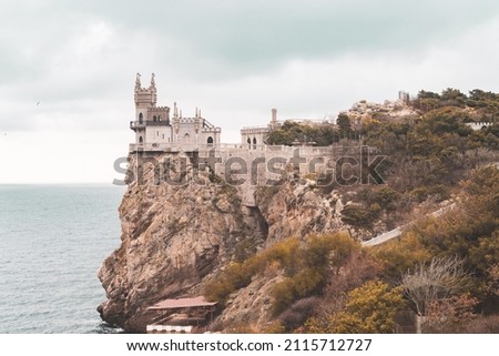 Overlook of the Swallow's Nest romantic castle on the Black sea shore in a cloudy autumn day